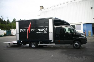 Towing the Weinhaus Neumann concessions trailer with sliding tarp system and hydraulic lift