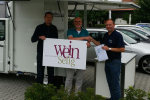 Our colleague Thomas Thiel is passing a wine catering vehicle to Keith Bain and Frank Elsesser